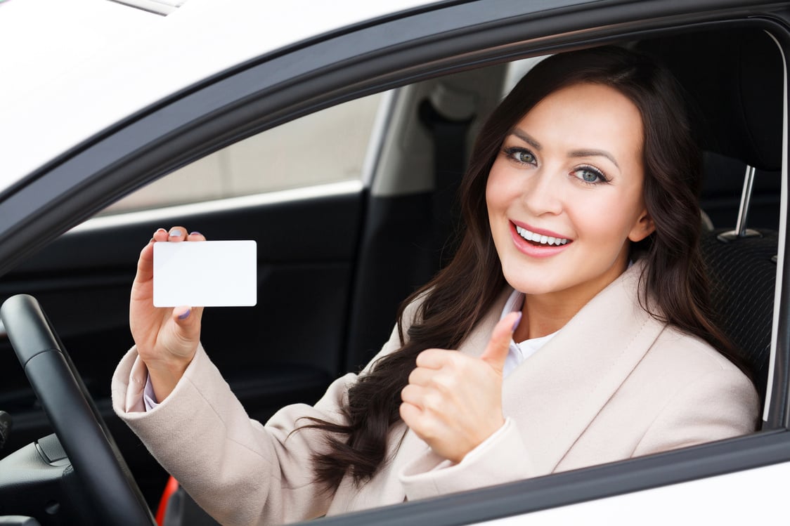 Beautiful Young Girl Sitting in White Car 